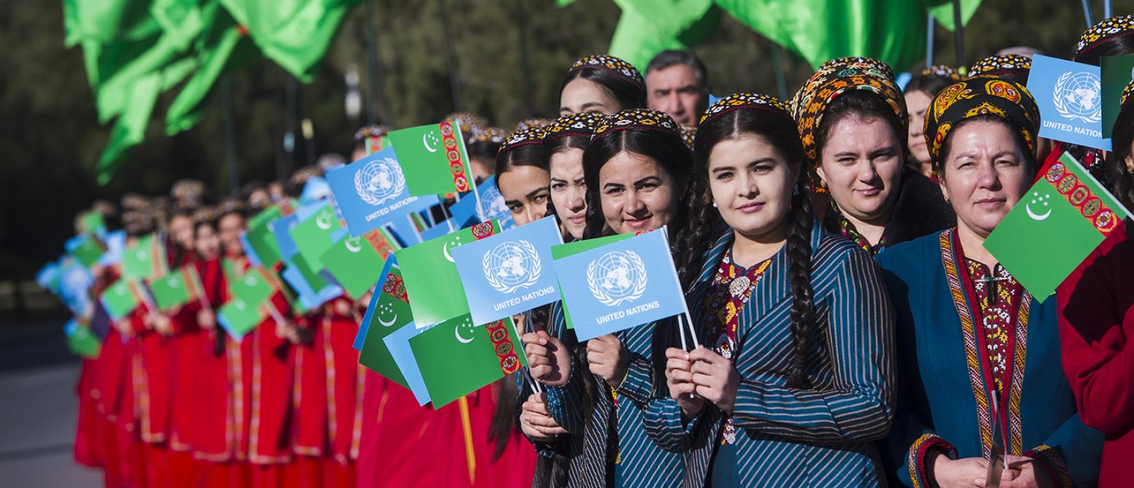 Young people celebrating the opening of the new United Nations House in Ashgabat, Turkmenistan.