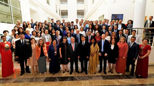 UN Secretary-General Antonio Guterres stands with UN Staff during his visit to Turkmenistan. 